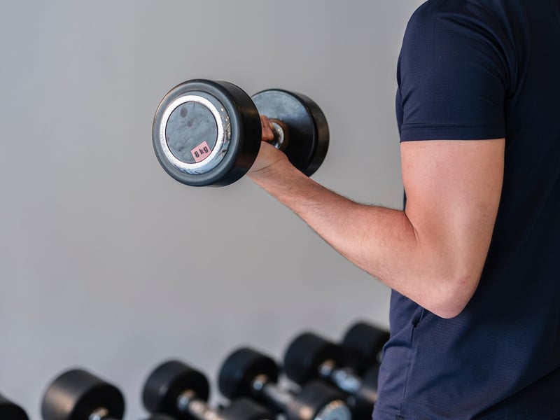 Man performing deadlifts